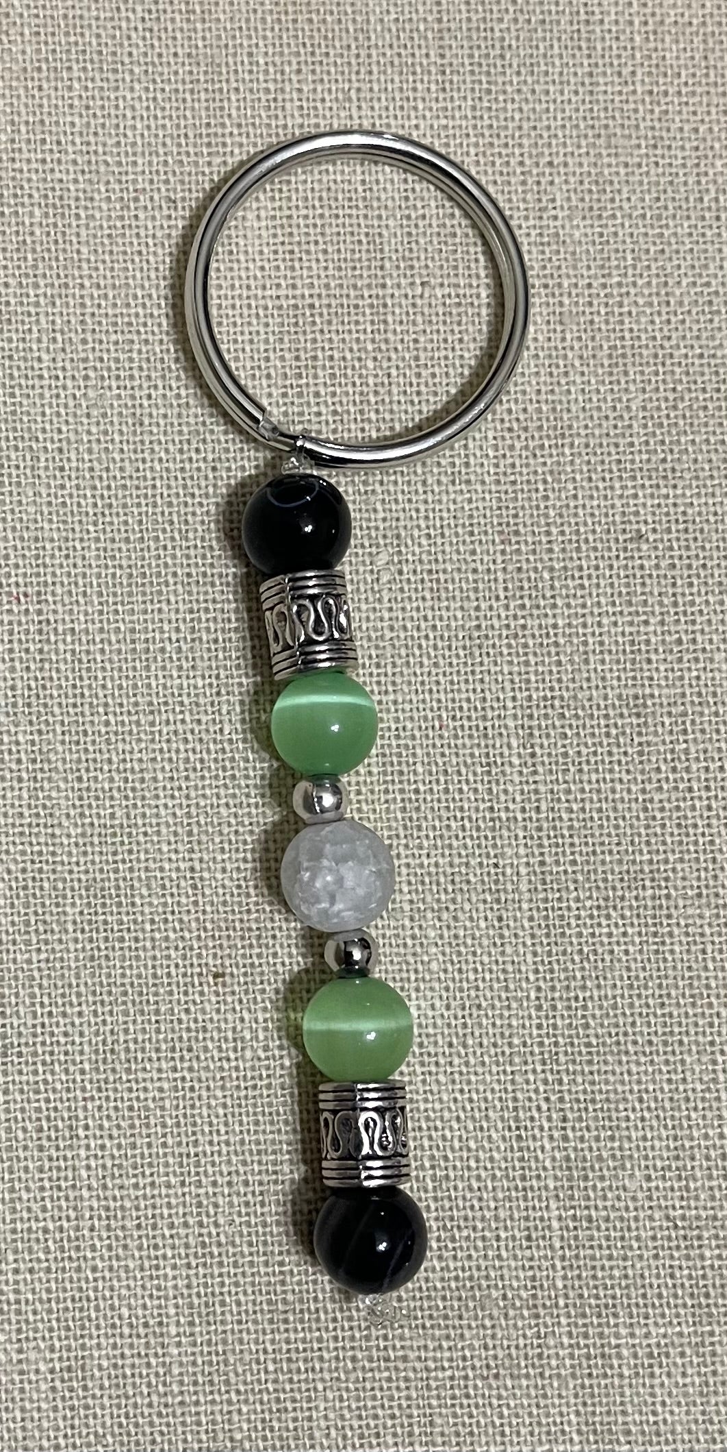 Black agate, cat’s eye, & crackle quartz keychain
