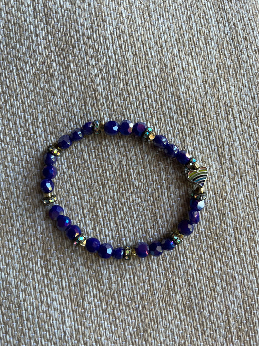 Purple glass beads with rainbow heart