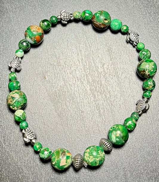 Dyed imperial jasper stone bracelet with turtles