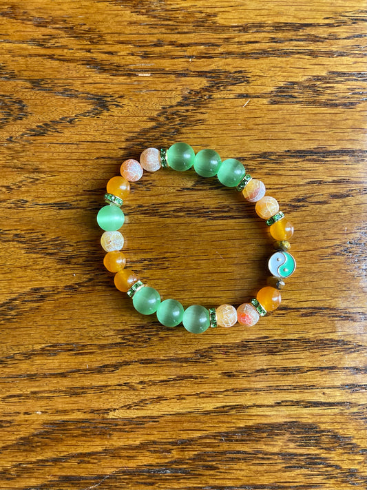 Cat’s eye with crackle agate, quartz, tiger’s eye bracelet, with green yin & yang symbol