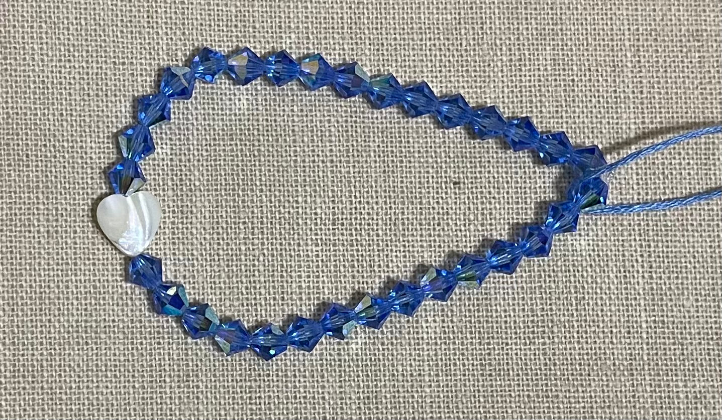 Sapphire crystals with shell heart stone