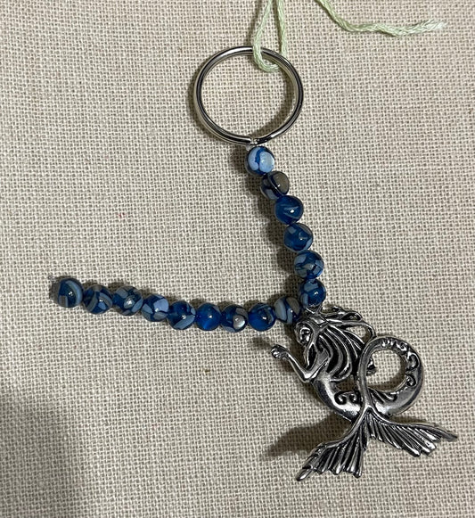 Reconstituted shell keychain