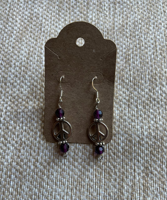 Peace sign earrings with purple glass beads