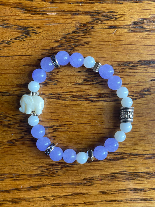 Purple dyed quartz stone bracelet with white stone elephant
