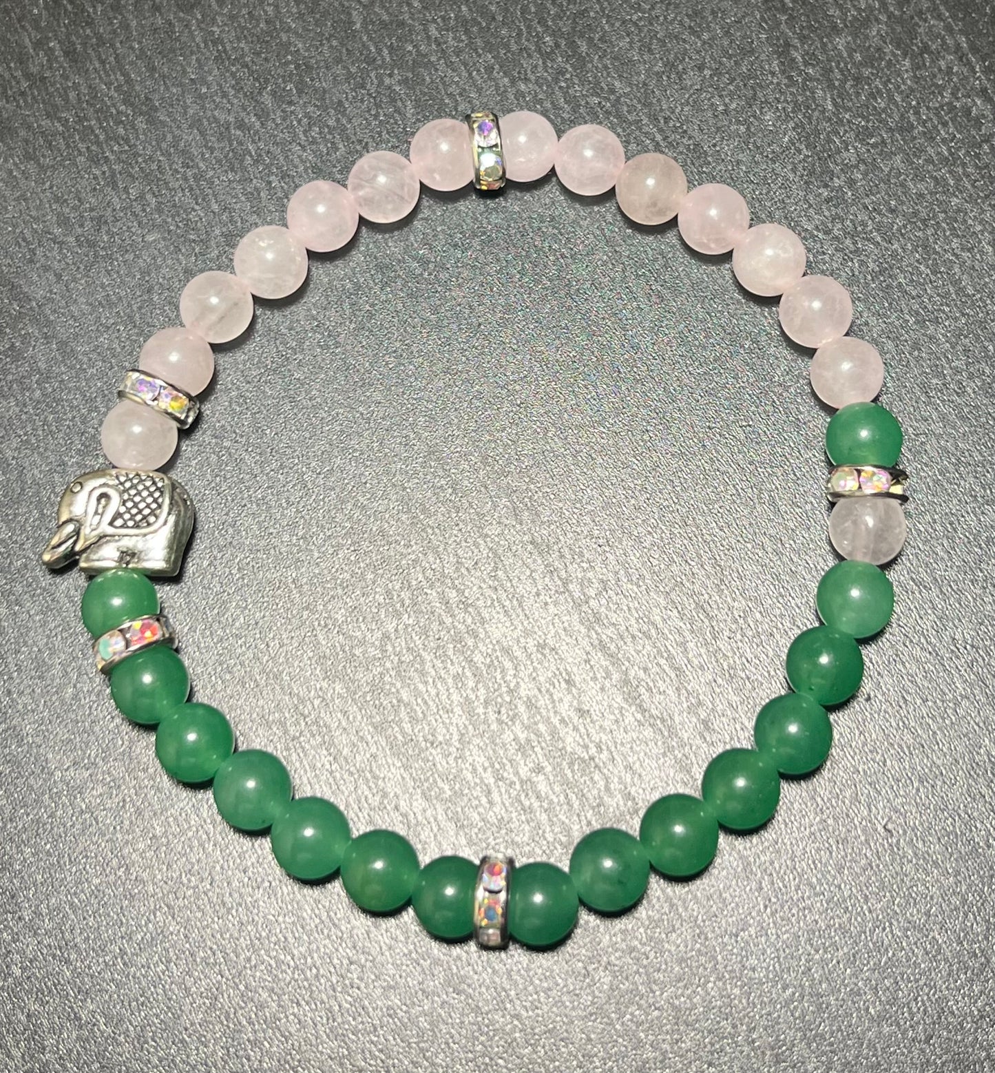 Dyed rose quartz and green aventurine stone with elephant