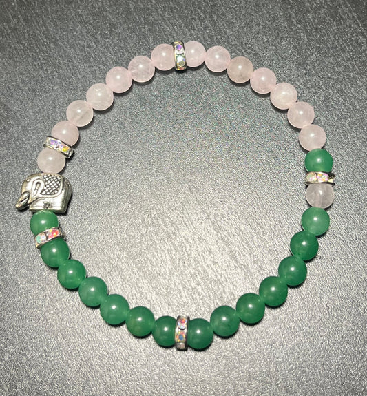 Dyed rose quartz and green aventurine stone with elephant