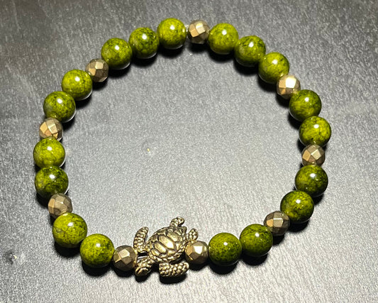 Green dyed quartz stone bracelet with turtle