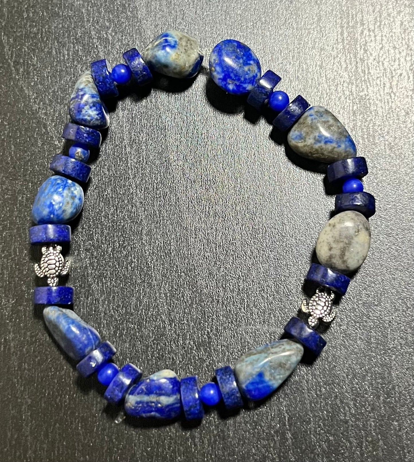 Blue sodalite stone bracelet with turtles